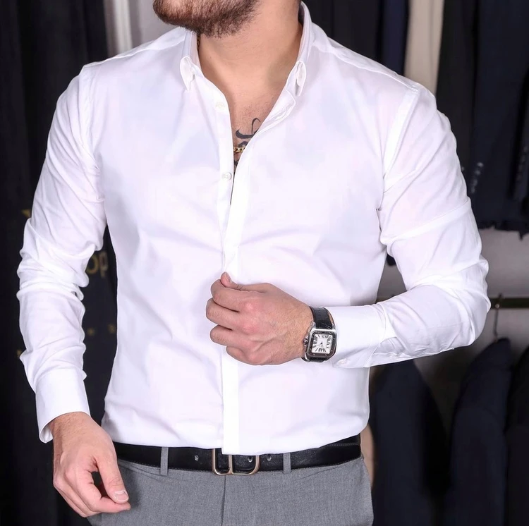 1671573247_95744 پیراهن رسمی سفید پارچه دوشین M تا 3XL پارچه درجه یک چروک نمیشه / دکمه مخفی - Image 1