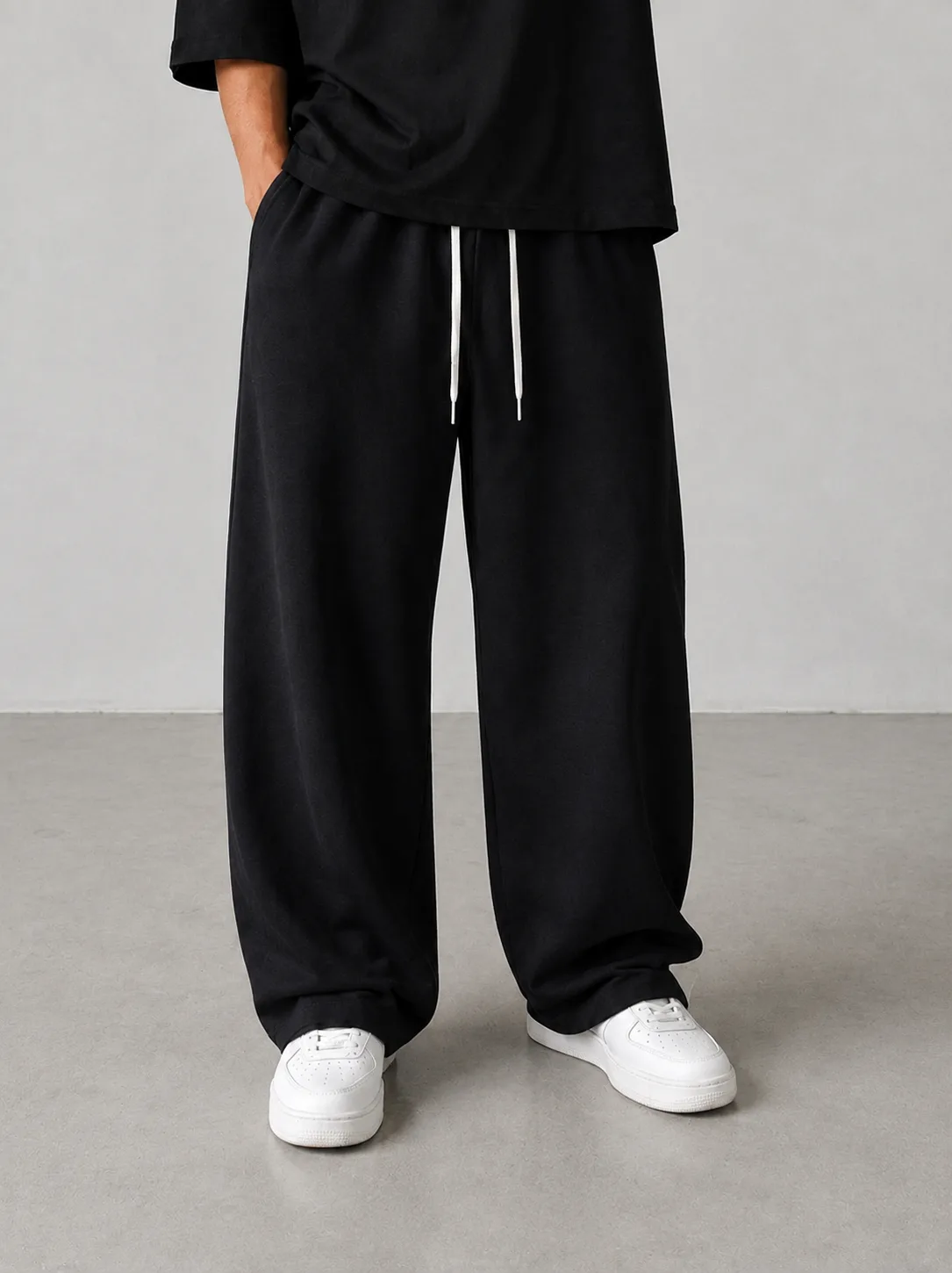 Bag-style-fabric-pants-premium-Oisou-fabric-black-color-heroshoop.webp شلوار پارچه ای بگ استایل / پارچه درجه یک اویشو / رنگ مشکی 27180 - Image 1