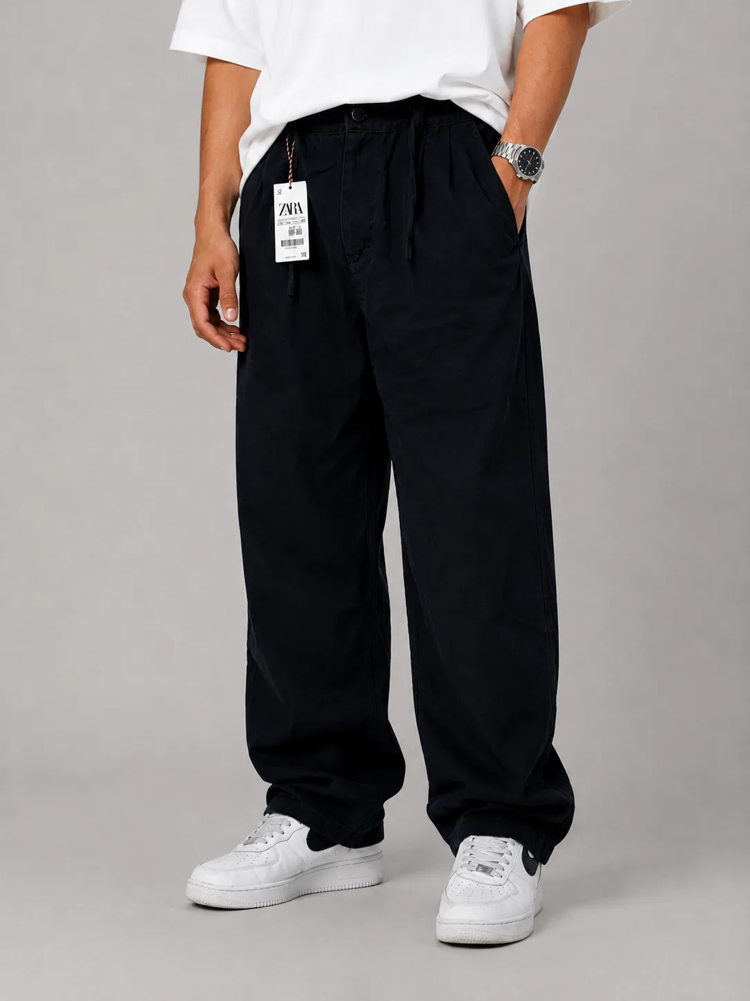 Baggy-Style-Fabric-Pants-Black-Lycra-Fabric-Cocoon-heroshoop.webp شلوار پارچه ای بگ استایل /پارچه لیوسل رنگ مشکی / پیله دار - Image 1