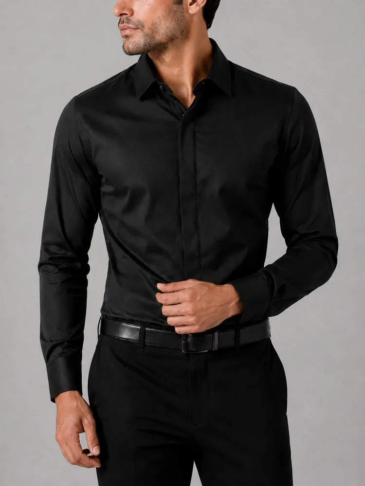 Formal-men-shirt-Tetron-fabric-hidden-button-black-color-heroshoop.webp پیراهن مردانه رسمی پارچه تترون دکمه مخفی رنگ مشکی 27166 - Image 1