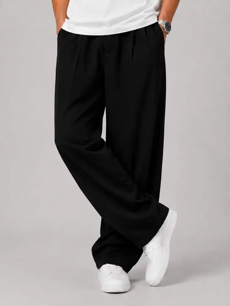 Natural-Lyocell-fabric-half-bag-pants-long-length-108-black-color-with-cocoon-heroshoop.webp شلوار پارچه ای نیم بگ پارچه لایوسل طبیعی / قد بلند ۱۰۸ / رنگ مشکی پیله دار - Image 1
