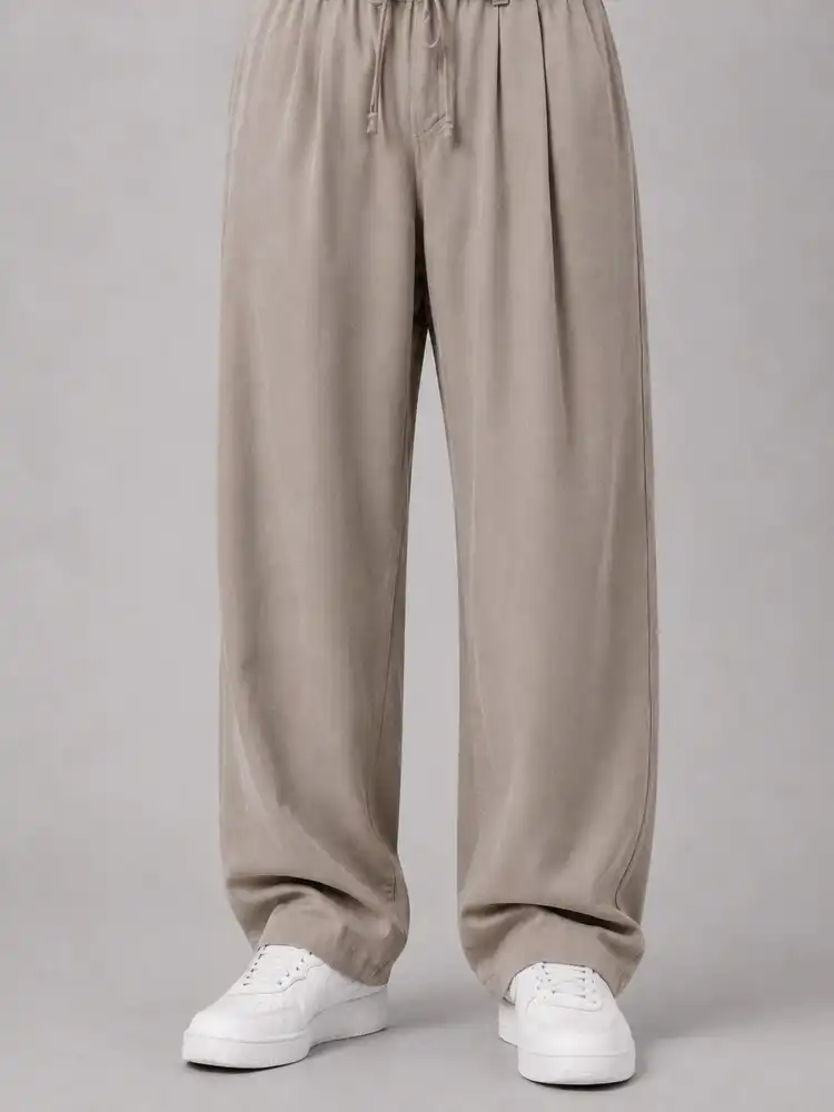 Natural-Lyocell-fabric-half-bag-pants-long-length-108-khaki-color-with-cocoon-heroshoop.webp شلوار پارچه ای نیم بگ پارچه لایوسل طبیعی / قد بلند ۱۰۸ / رنگ خاکی پیله دار - Image 1