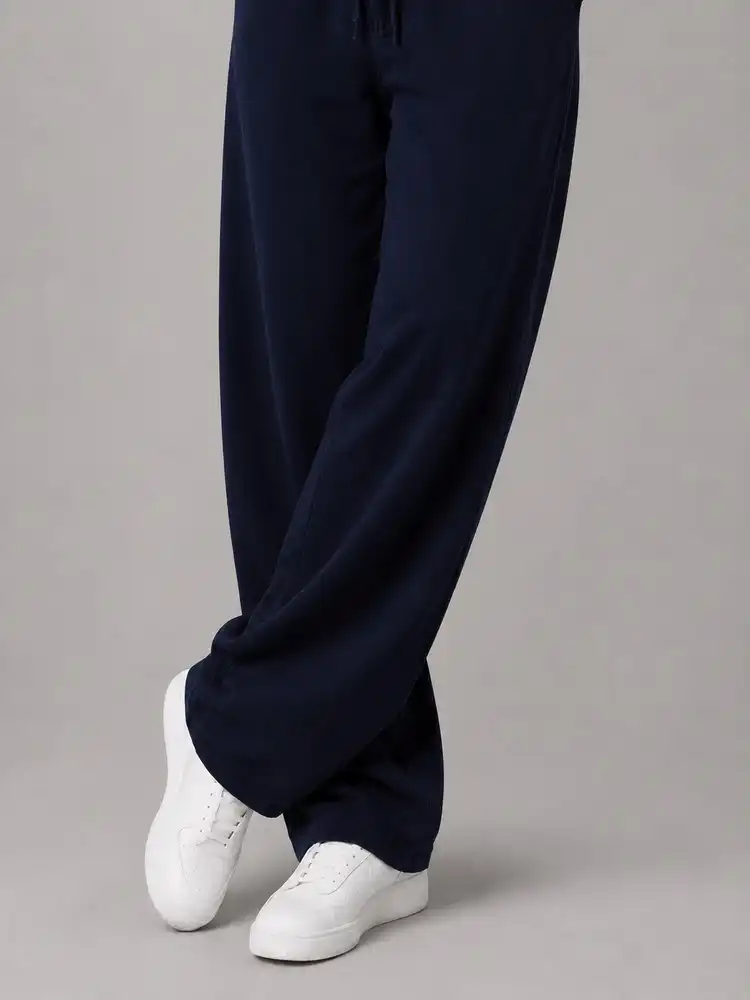 Natural-Lyocell-fabric-half-bag-pants-long-length-108-navy-color-with-cocoon-heroshoop.webp شلوار پارچه ای نیم بگ پارچه لایوسل طبیعی / قد بلند ۱۰۸ / رنگ سرمه ای پیله دار - Image 1
