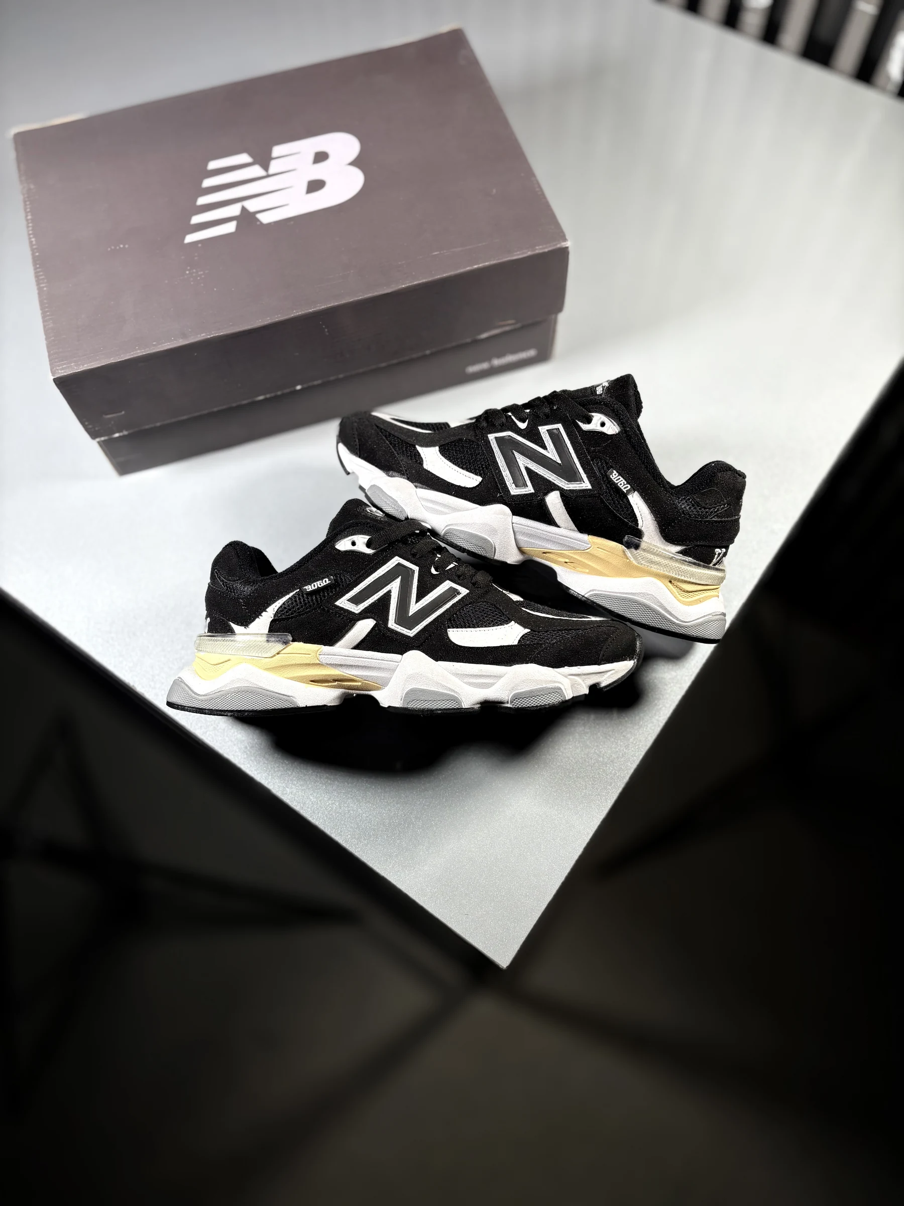 New-Balance-9060-sneakers-black-white-and-yellow-heroshoop.webp کتونی اسپرت نیوبالانس 9060 / مشکی سفید / کد 2560 - Image 1