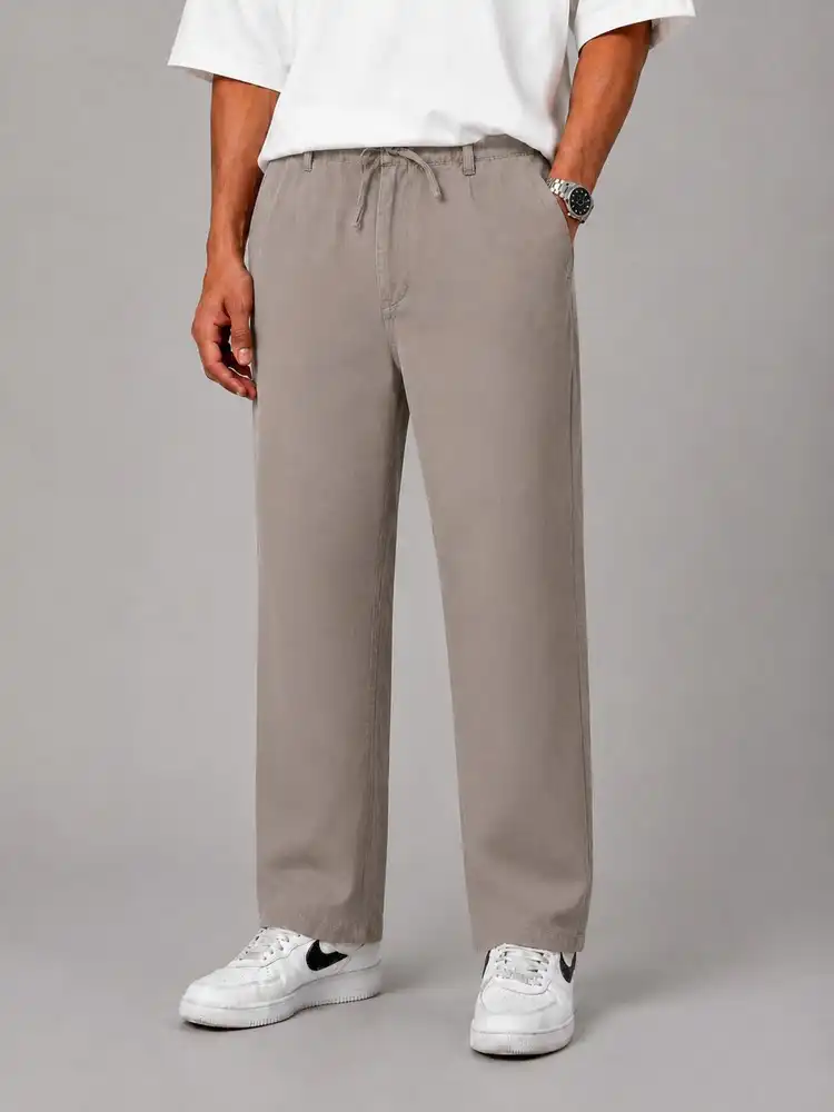 Simple-baggy-style-fabric-pants-Cream-color-2nd-grade-lyocell-fabric-Suitable-for-the-season-heroshoop.webp شلوار پارچه ای بگ استایل ساده / پارچه لیوسل رنگ کرم 2 درجه یک / مناسب فصل - Image 1