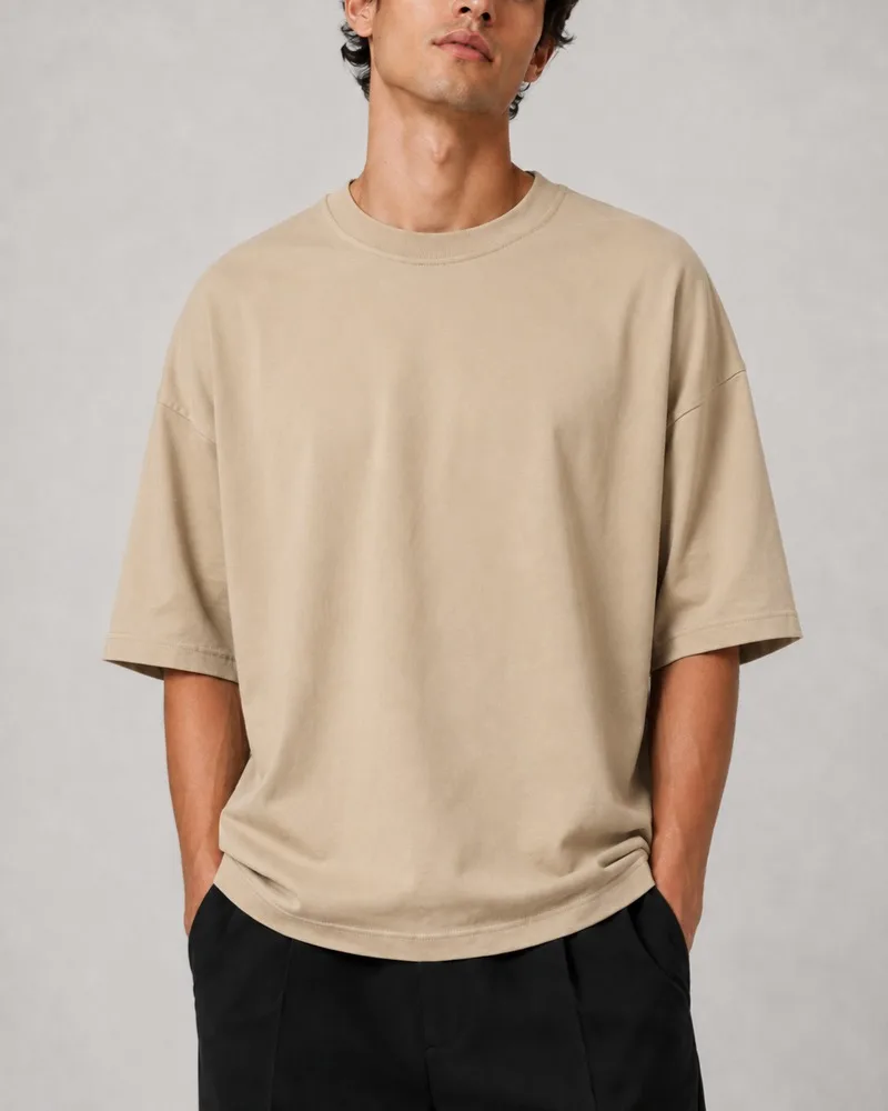 Simple-beige-cotton-T-shirt-with-two-thread-design-Heroshoop.webp تیشرت ساده پنبه دو نخ / رنگ کرم / کد 27133 - Image 1