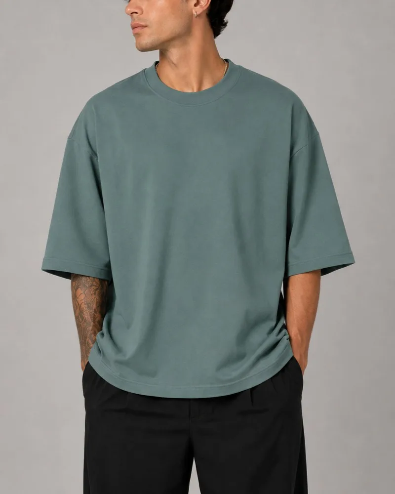 Simple-smoky-green-cotton-T-shirt-with-two-thread-design-Heroshoop.webp تیشرت ساده پنبه دو نخ / رنگ سبز دودی / کد 27137 - Image 1