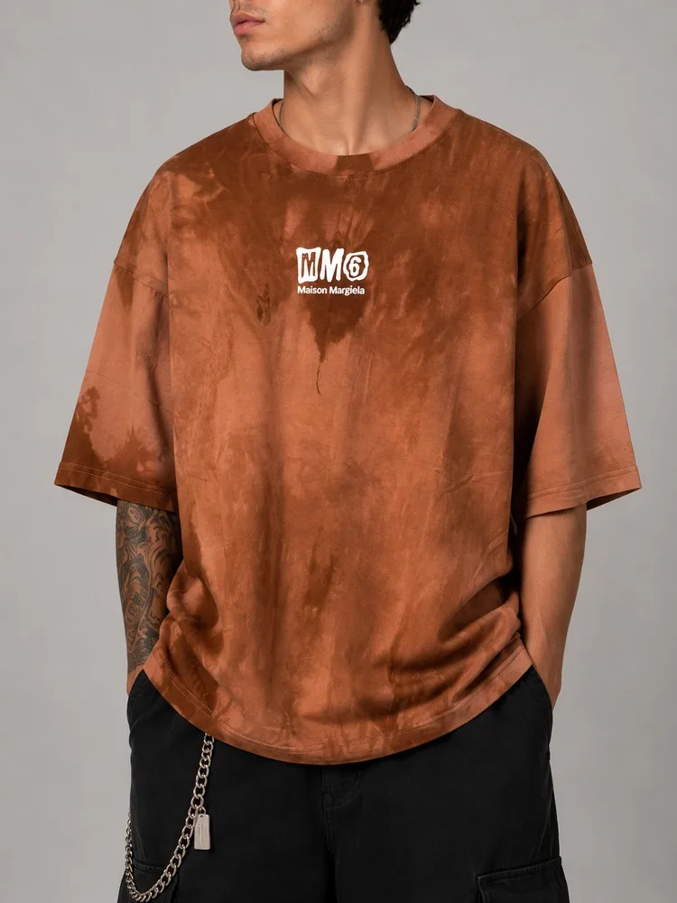 Watercolor-biscuit-pattern-sports-T-shirt-made-of-cotton-in-brown-color-heroshoop.webp تیشرت اسپرت آبرنگی پارچه پنبه بیسکوییتی / رنگ قهوه ای / کد 27146 - Image 1