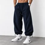 Baggy-style-joggers-3-thread-French-terry-cotton-Length-110-cm-Elastic-waistband-Adjustable-cuffs-with-toggles-Navy-blue-Code-8005-www.heroshoop.com-view-1.webp