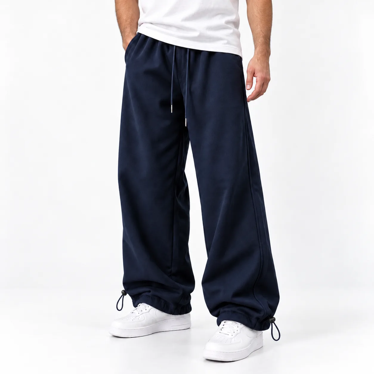 Baggy-style joggers Elastic waistband Adjustable cuffs with toggles Navy blue Code 8005 www.heroshoop.com view 1 Baggy-style-joggers-Elastic-waistband-Adjustable-cuffs-with-toggles-Navy-blue-Code-8005-www.heroshoop.com-view-1.webp