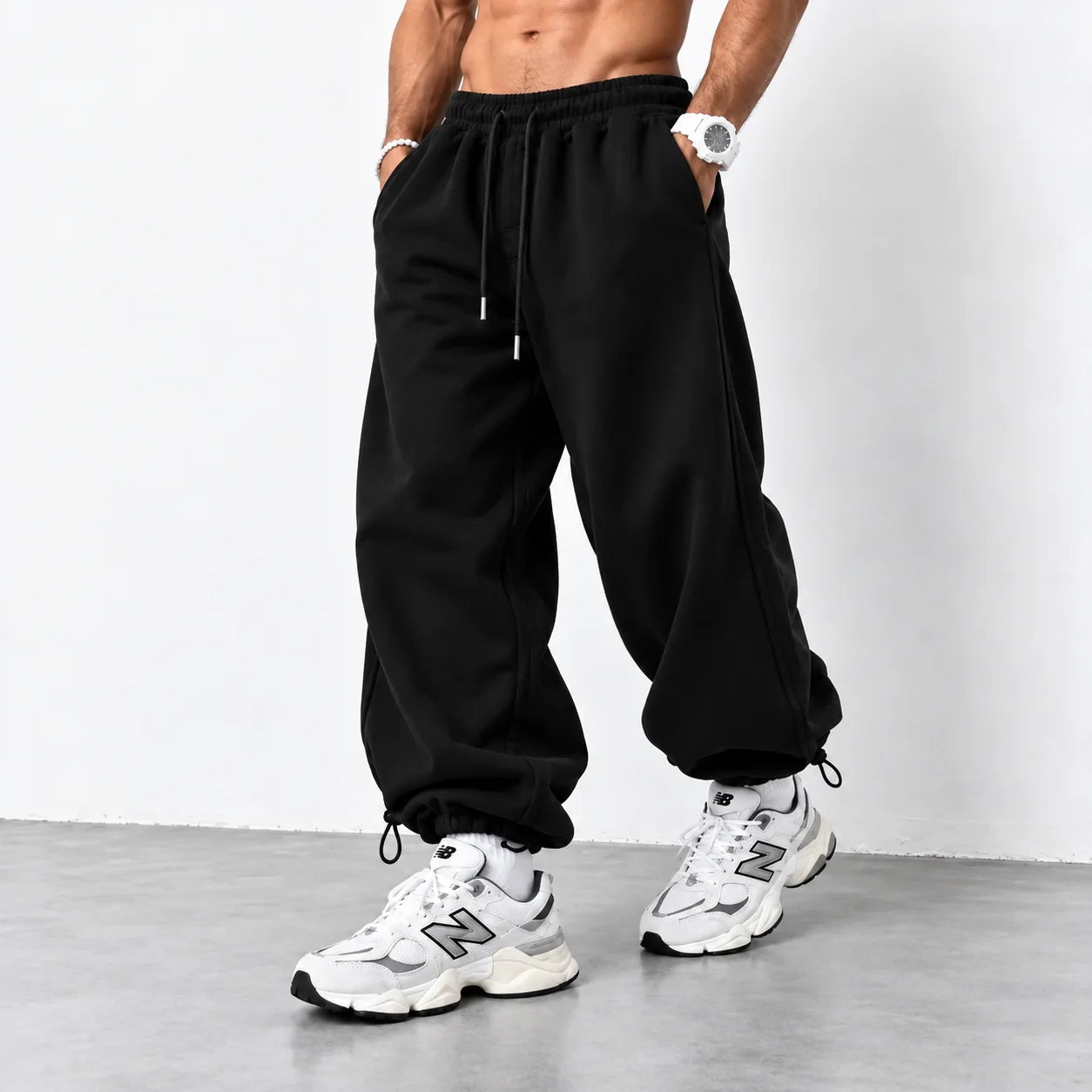 Black Baggy Joggers Loose fit with fitted cuffs Adjustable cuffs with stoppers Code 8006 www.heroshoop.com View 1 Black-Baggy-Joggers-Loose-fit-with-fitted-cuffs-Adjustable-cuffs-with-stoppers-Code-8006-www.heroshoop.com-View-1.webp